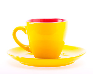 Image showing Yellow Color Cup On Plate