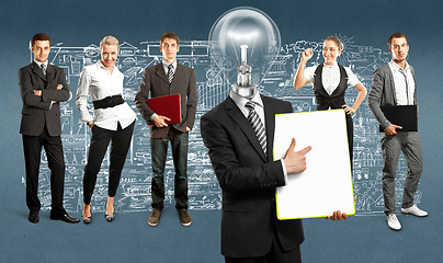 Image showing Business Team With Lamp Head