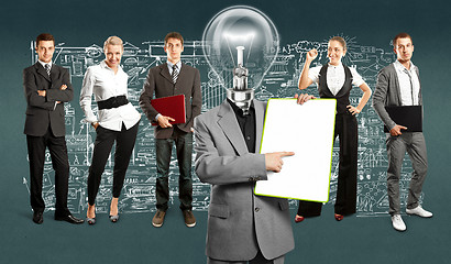 Image showing Business Team With Lamp Head