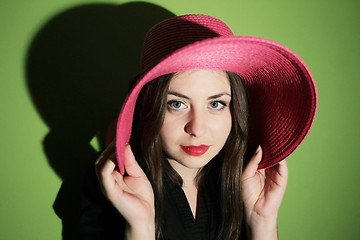 Image showing Woman with pink straw hat