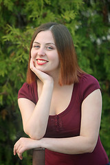 Image showing Young brunette posing outside