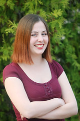 Image showing Brunette posing outdoors