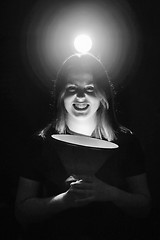 Image showing Woman posing with scary face black and white