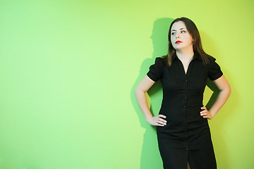 Image showing Woman posing on green background