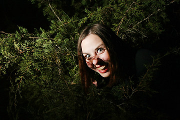 Image showing Girl goofing in trees