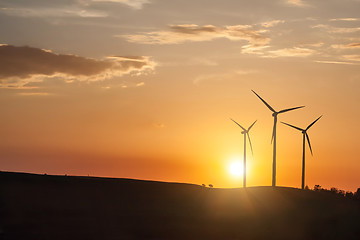 Image showing wind generator turbines on sunset