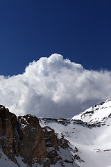 Image showing Snowy rocks with snow cornice