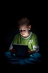 Image showing Boy holding tablet 