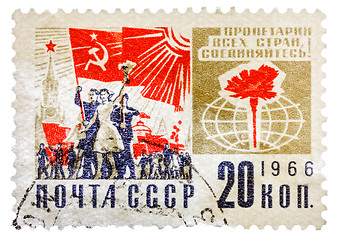 Image showing Postcard printed in the USSR shows the political slogan 