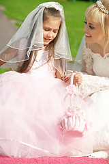 Image showing happy bride and little bridesmaid