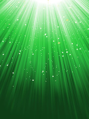 Image showing Snow and stars on green luminous rays. EPS 8