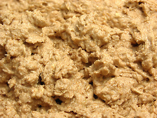 Image showing Mixed unbaken chocolate dough in a close-up view