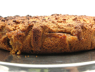 Image showing Wholemeal cake with pears arranged on a tray