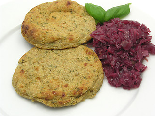 Image showing Round flat potato dough cakes with basil and red cabbage