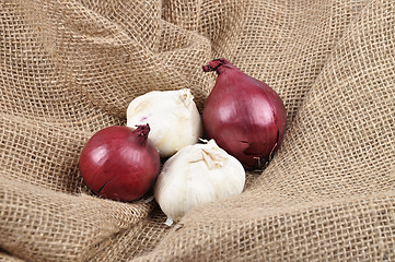 Image showing Onions and garlic on jute