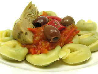 Image showing Tortellini  with tomato sauce, olives and artichoke