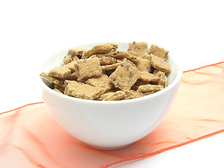 Image showing A bowl of chinaware filled with dog cookies