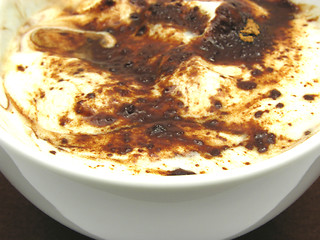 Image showing Yogurt floured with chocolate in a bowl of chinaware