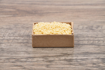 Image showing Couscous on wood