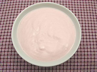 Image showing Curd cheese in a bowl of chinaware on checked  tablecloth 