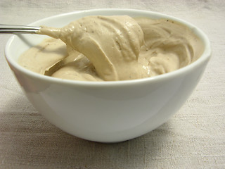 Image showing Quark cheese mixed as dip in a bowl of chinaware on a placemat