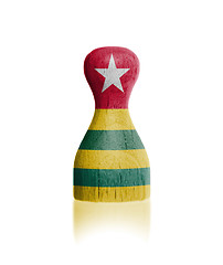 Image showing Wooden pawn with a flag painting