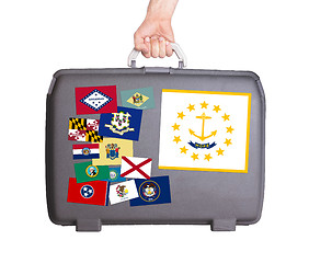 Image showing Used plastic suitcase with stains and scratches