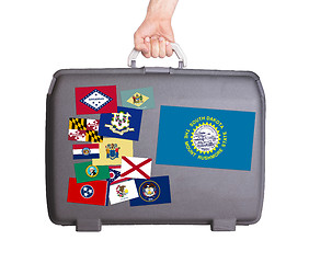 Image showing Used plastic suitcase with stains and scratches