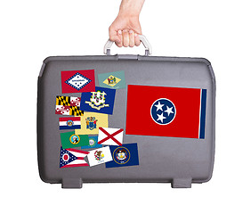 Image showing Used plastic suitcase with stains and scratches