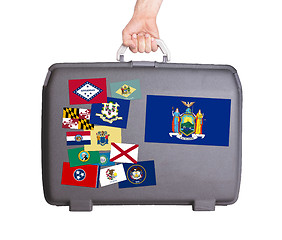 Image showing Used plastic suitcase with stains and scratches