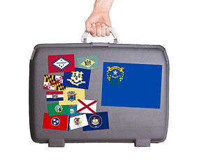 Image showing Used plastic suitcase with stains and scratches