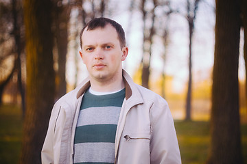 Image showing Headshot Of A Young Man Looking At Camera In Park