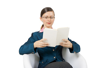 Image showing Young woman in glasses with a book