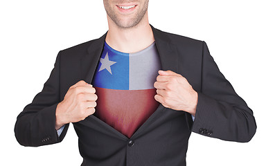 Image showing Businessman opening suit to reveal shirt with flag