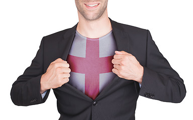 Image showing Businessman opening suit to reveal shirt with flag