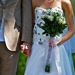 Image showing Wedding Couple Standing With Bouquet