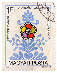 Image showing Stamp printed in Hungary shows Congress emblem as flower