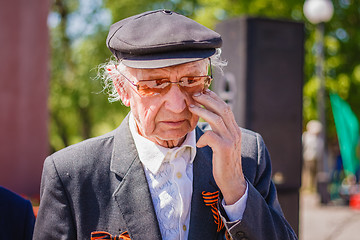 Image showing Unidentified crying veteran  during the celebration of Victory D