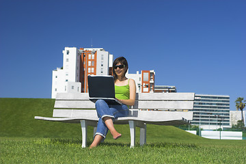 Image showing Outdoor working with a laptop