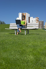 Image showing Outdoor working with a laptop