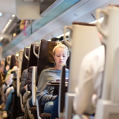 Image showing Lady waiting at the railway station.