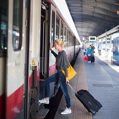 Image showing Lady waiting at the railway station.