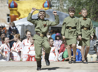 Image showing Kid with sword dance