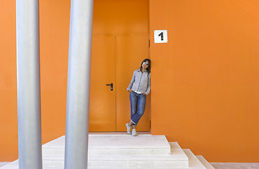 Image showing Woman in orange