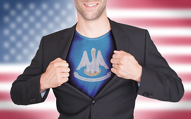 Image showing Businessman opening suit to reveal shirt with state flag