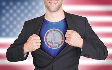 Image showing Businessman opening suit to reveal shirt with state flag