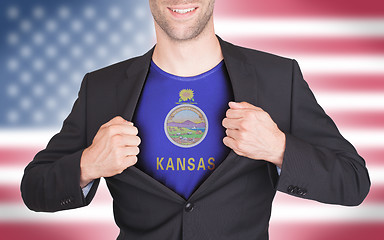 Image showing Businessman opening suit to reveal shirt with state flag