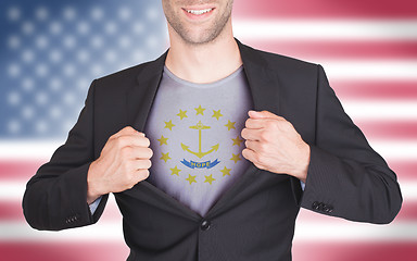 Image showing Businessman opening suit to reveal shirt with state flag