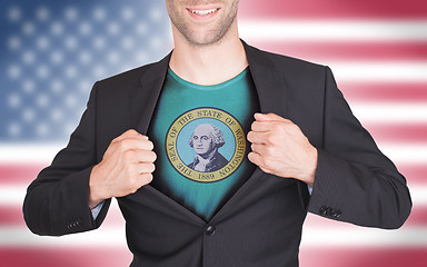 Image showing Businessman opening suit to reveal shirt with state flag