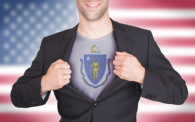 Image showing Businessman opening suit to reveal shirt with state flag